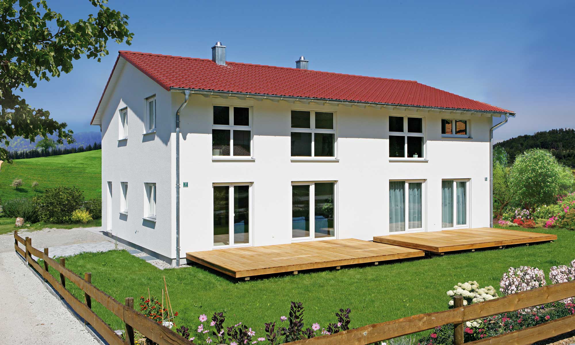 Garten und Terrasse Haus Harmayer von Fertighaus WEISS