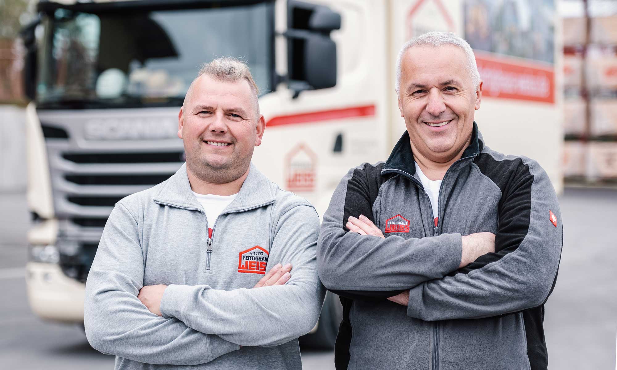 Bild LKW Fahrer Fertighaus Weiss